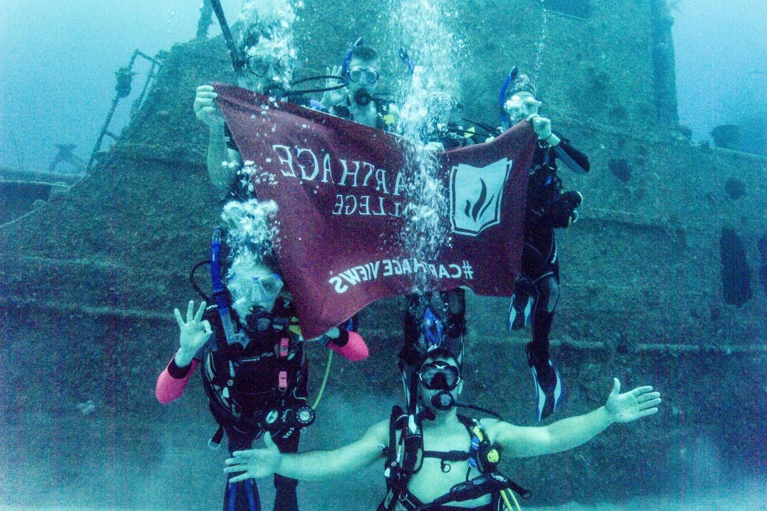 Underwater exploration: Students scuba dive in Honduras for the J-Term study tour Biodiversity, B...